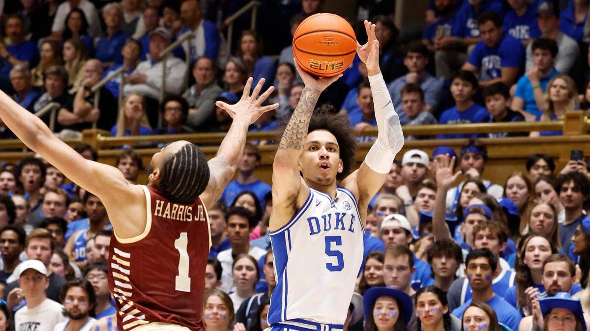 Duke’s Tyrese Proctor (5) shoots as Boston College’s Claudell Harris Jr. (1) defends during the first half of Duke’s game against Boston College at Cameron Indoor Stadium in Durham, N.C., Saturday, Feb. 10, 2024.