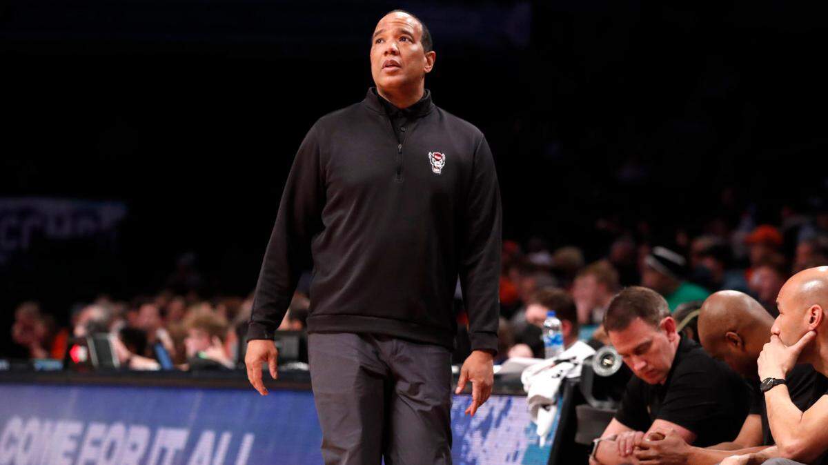 N.C. State head coach Kevin Keatts looks up at the scoreboard late in the second half of Clemson’s 70-64 victory over N.C. State in the first round of the ACC men’s basketball tournament at the Barclays Center in Brooklyn, N.Y., Tuesday, March 8, 2022.