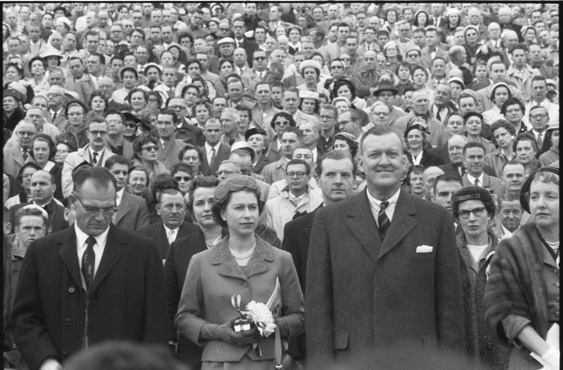 Queen Elizabeth ll attends the college football game between the University of North Carolina and the University of Maryland in College Park, Maryland, Oct. 19, 1957.