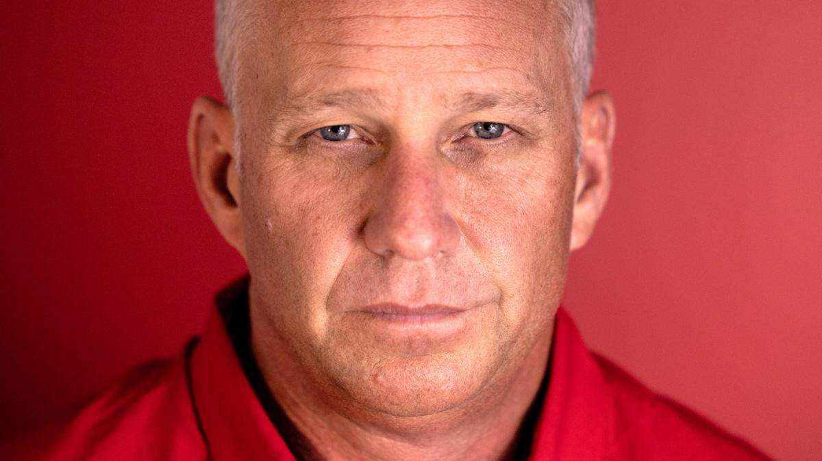 N.C. State’s Dave Doeren poses at the Murphy Center in Raleigh, N.C., Wednesday, June 19, 2024.