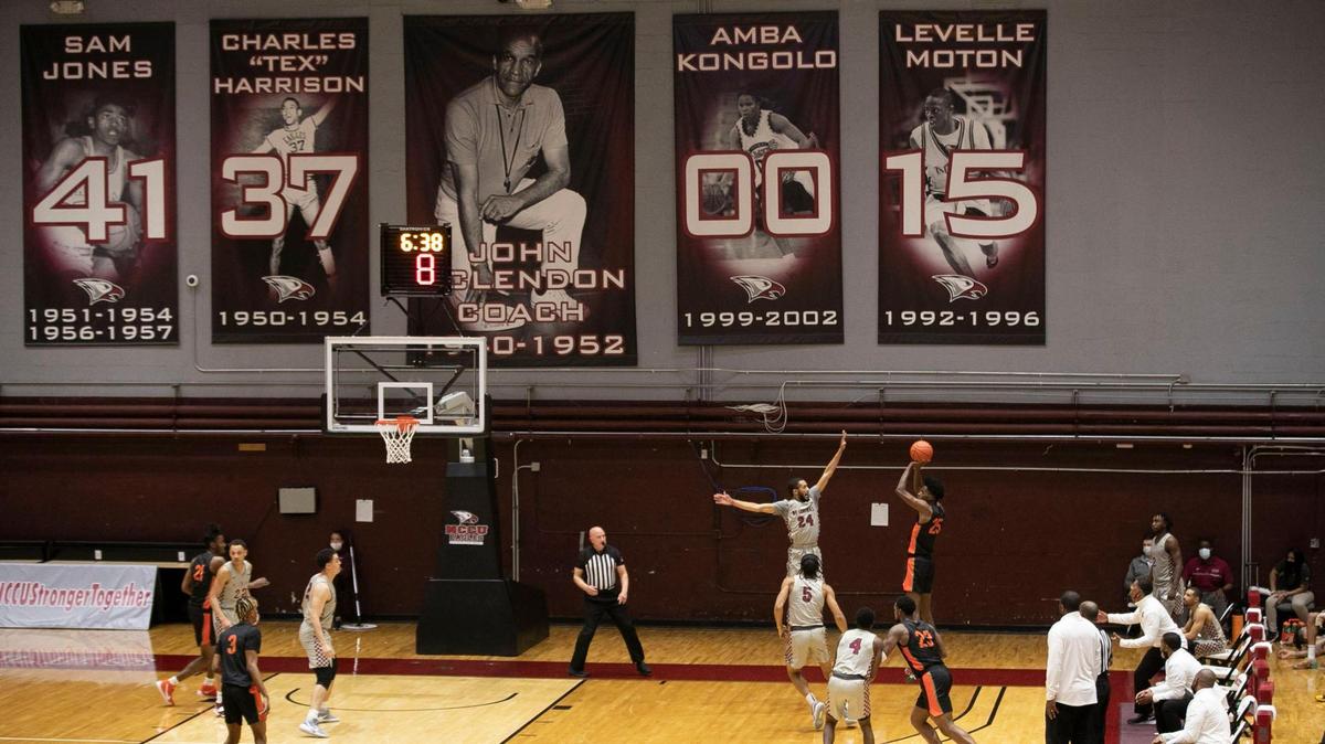 North Carolina Central University coach LeVelle Moton watches his team on defense against Florida A&M on March 3 at McDougald-Mclendon Arena in Durham. A large banner bearing his likeness and his retired jersey number (15) hangs in honor of his playing days at NCCU from 1992-96.