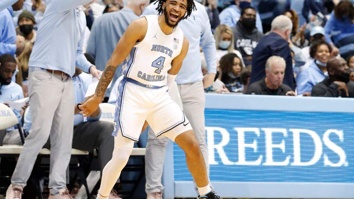 North Carolina’s RJ Davis (4) celebrates after hitting a three-pointer during UNCÕs 100-80 victory over N.C. State at the Smith Center in Chapel Hill, N.C., Saturday, Jan. 29, 2022.