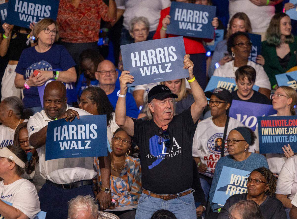 Music form a DJ moves supporters of Vice President Kamala Harris, the Democratic Presidential nominee, as they await her arrival on Sunday, October 13, 2024 at Minges Coliseum in Greenville, N.C.