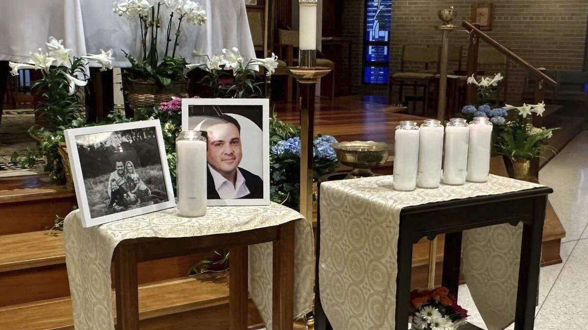 A memorial for Joshua Barrick on display Monday, April 10, 2023 at Holy Trinity Catholic Church in Louisville, Ky. Barrick, a senior vice president at Old National Bank in Louisville, was one of five people killed Monday in a mass shooting at the bank. It was the 146th mass shooting in the U.S. this year.