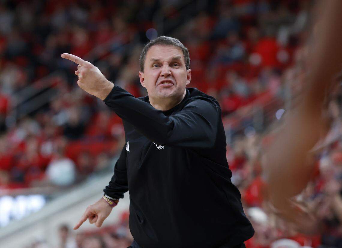 N.C. State head coach Will Wade speaks with an official during the second half of the Wolfpack’s 110-64 win over UNC Greensboro on Wednesday, Nov. 12, 2025, at Lenovo Center in Raleigh, N.C.