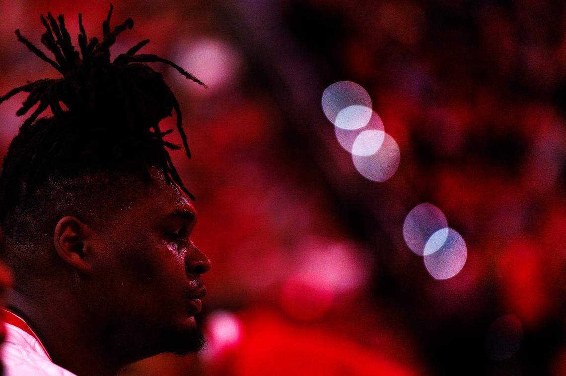 N.C. State’s DJ Burns Jr. listens during starting lineups prior to the Wolfpack’s 76-60 win over Virginia on Saturday, Jan. 6, 2024, at PNC Arena in Raleigh, N.C.