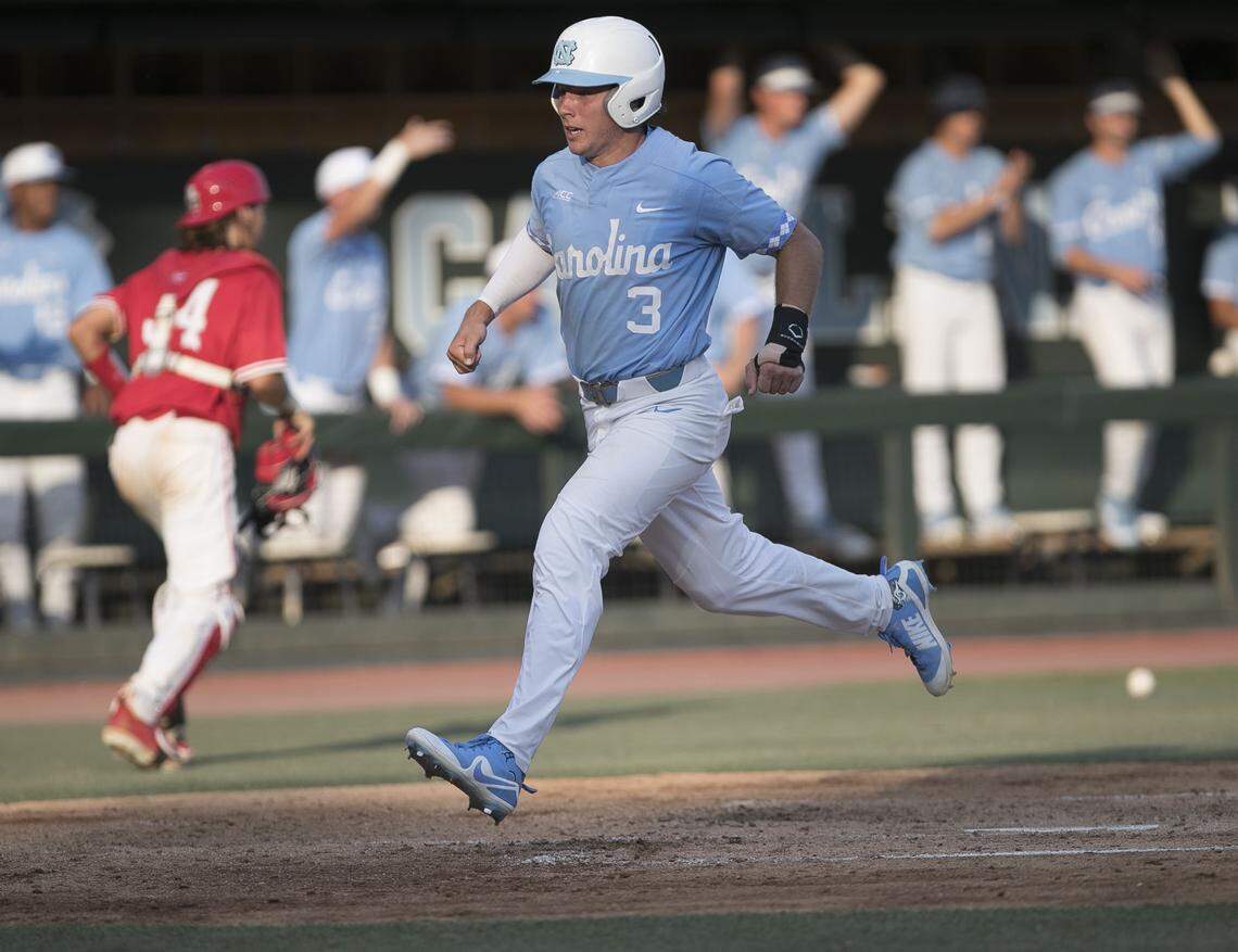 North Carolina’s Kyle Datres (3) scores on a wild pitch by Houston’s Lael Lockhart to tie the game 3-1 in the third inning during the NCAA Regional on Sunday, June 3, 2018 at Boshamer Stadium in Chapel Hill, N.C.