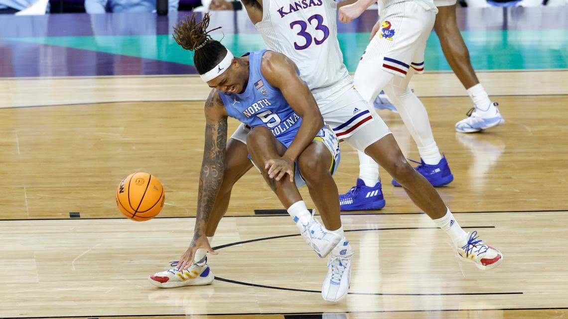 North Carolina’s Armando Bacot (5) winces in pain after being injured late in the second half of Kansas’ 72-69 victory over UNC in the NCAA Men’s National Championship at the Caesars Superdome in New Orleans, La., Monday, April 4, 2022.