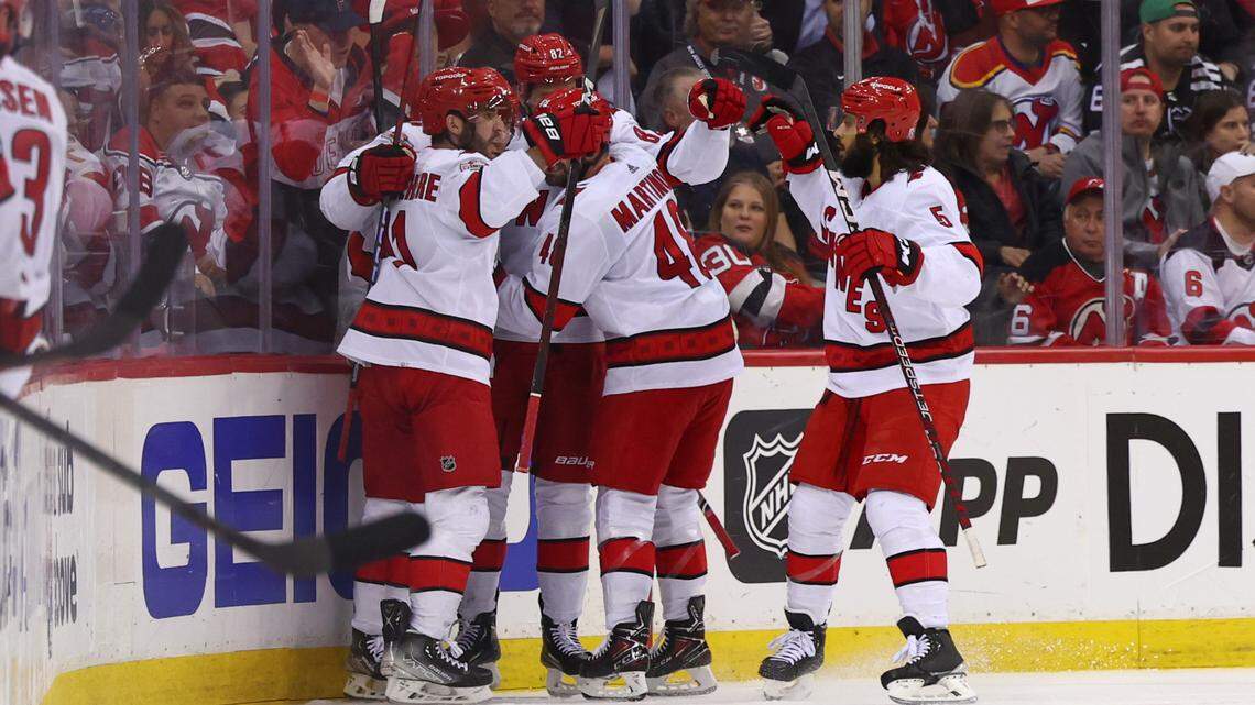 Carolina Hurricanes forward Jordan Martinook (48) congratulates teammate Jesper Fast (71) on his goal against the New Jersey Devils during the second period in game four of the second round of the 2023 Stanley Cup Playoffs at Prudential Center on Tuesday, May 9. Martinook was originally credited with an assist on the goal.
