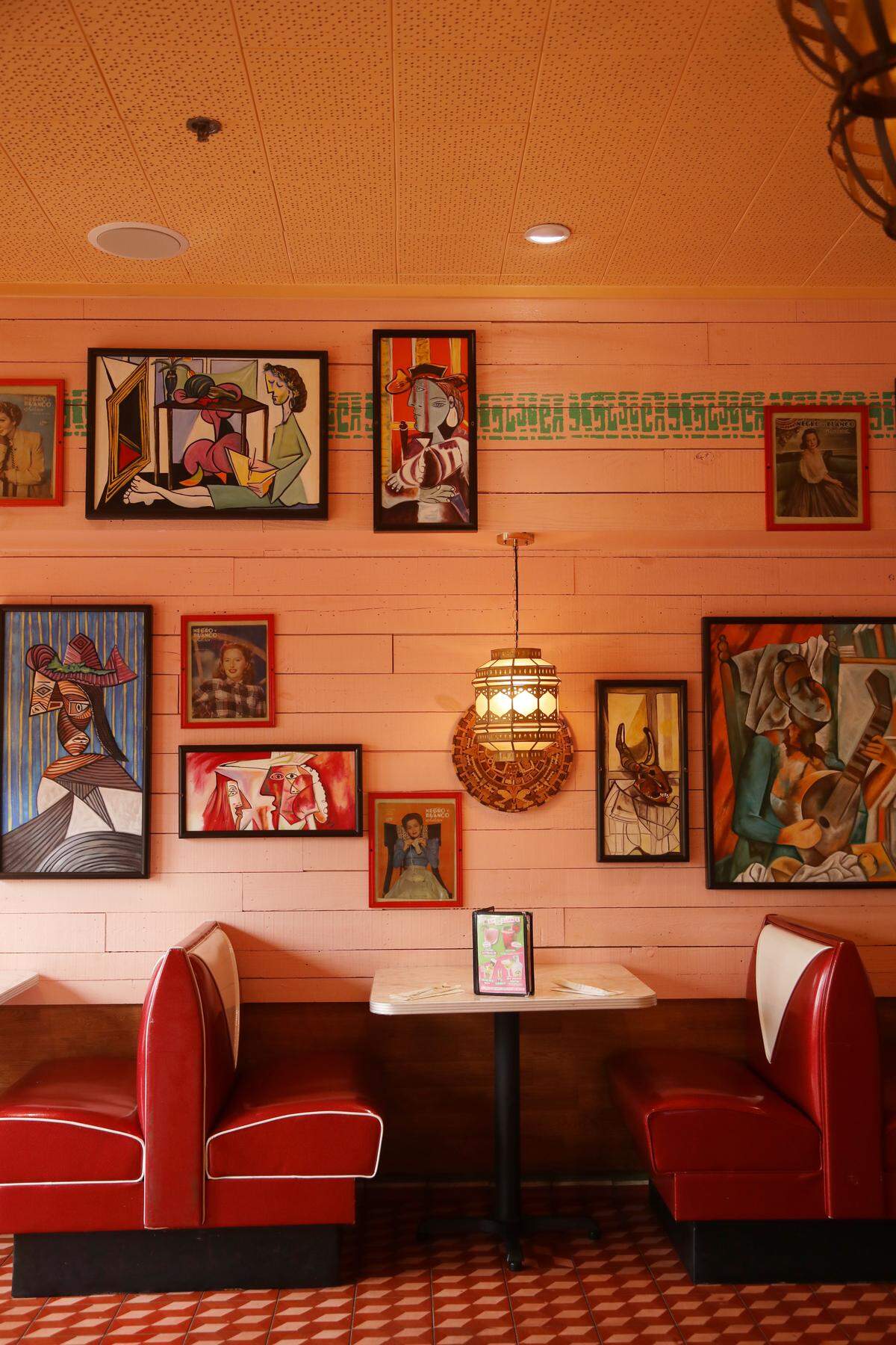 Chuy’s in Cary has an eclectic atmosphere with ’50s vintage chrome and Formica table settings, whimsical Picasso-inspired paintings, and a colorful tiled floor.