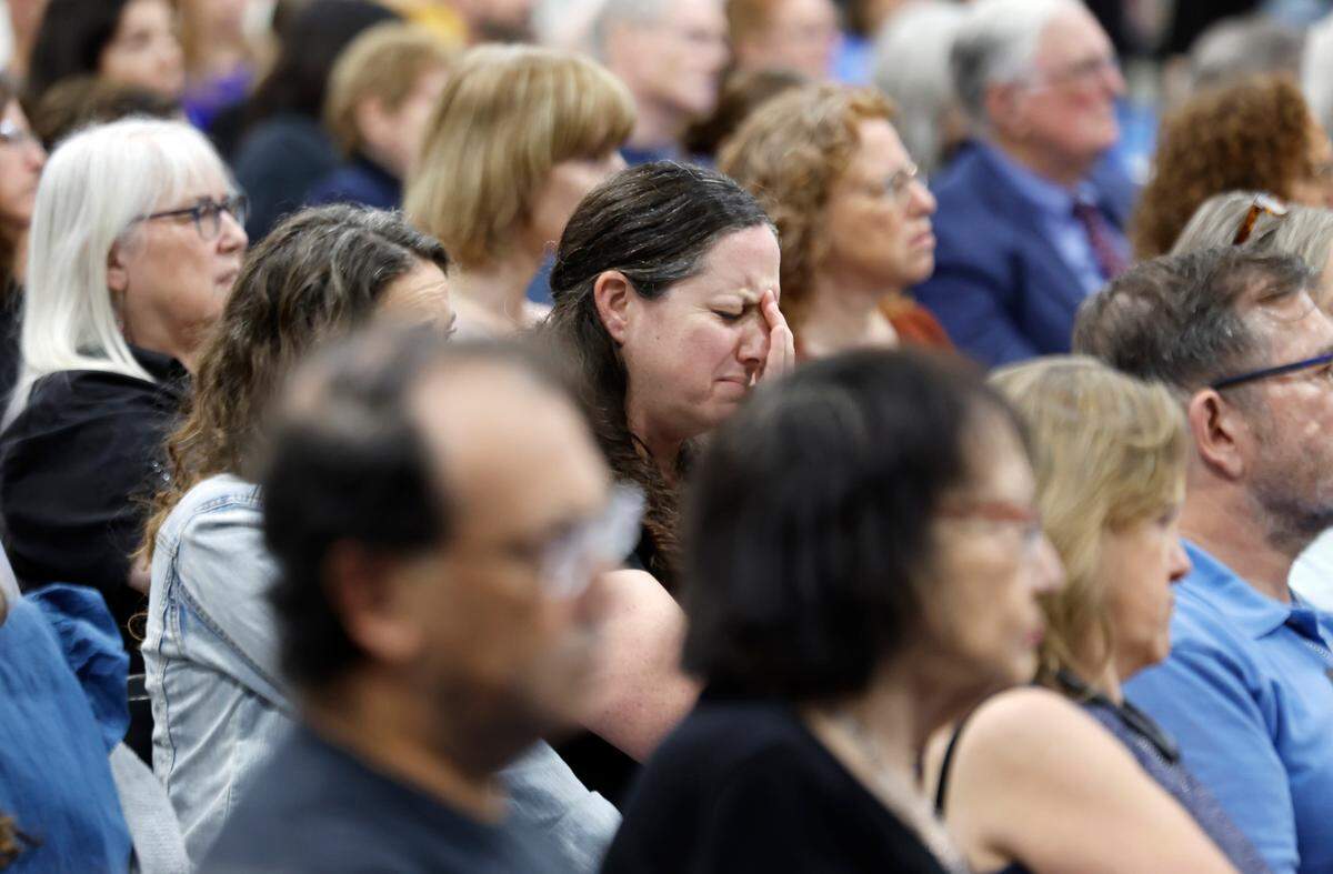 Attendees listen as Sagi Gabay recounts surviving the October 7, 2023, attack on Israel by Hamas while attending the NOVA music festival. More than 380 people who attended the festival were killed. Gabay spoke during an October 7th Commemoration presented by the Jewish Federation of Greater Raleigh Monday, Oct. 7, 2024. Over 500 people gathered to commemorate the one year anniversary of the attack.