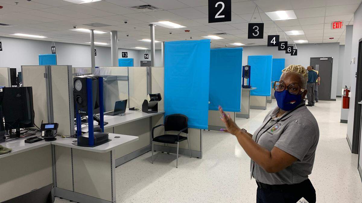 Tanika Williams, the senior examiner at the DMV’s Raleigh East driver’s license office on New Bern Avenue, gives a tour of the room where customers meet with examiners.