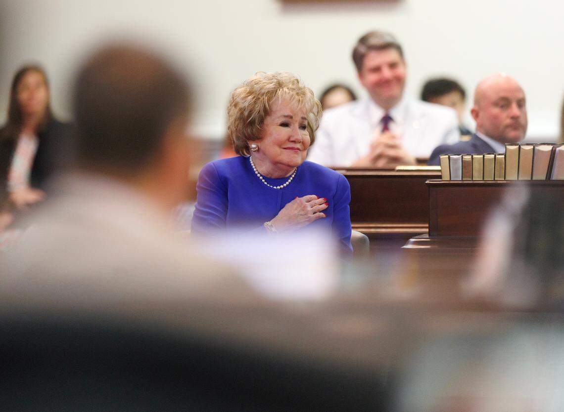 Former U.S. Sen. Elizabeth puts a hand over her heart as Sen. Dan Blue speaks about her career during a special ceremony in the Senate chamber of the Legislative Building on Wednesday, June 4, 2025, in Raleigh, N.C.