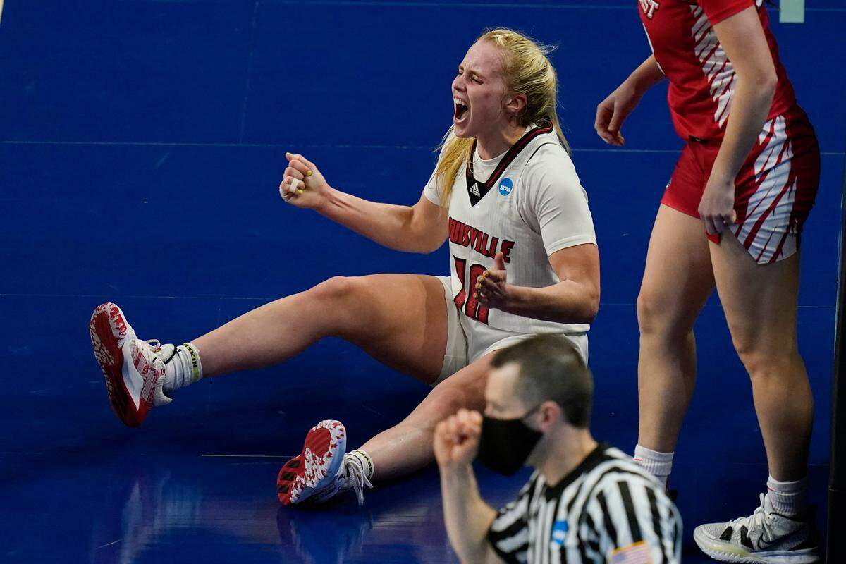 Louisville guard Hailey Van Lith (10) reacts after a favorable call during the first half of a college basketball game against Marist in the first round of the women’s NCAA tournament at the Alamodome in San Antonio, Monday, March 22, 2021. 