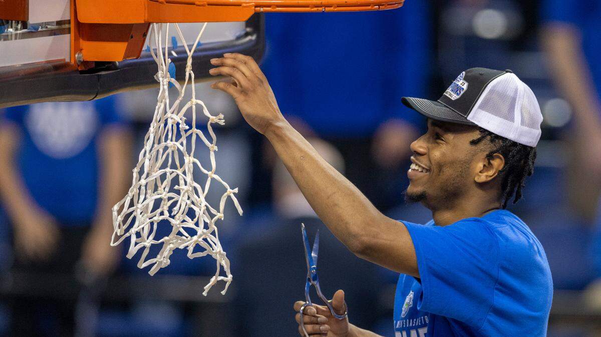 Duke’s Jeremy Roach (3) celebrates by cutting down the net after leading the Blue Devils to an ACC Tournament Championship with a 59-49 victory over Virginia on Saturday, March 11, 2023 at the Greensboro Coliseum in Greensboro, N.C.