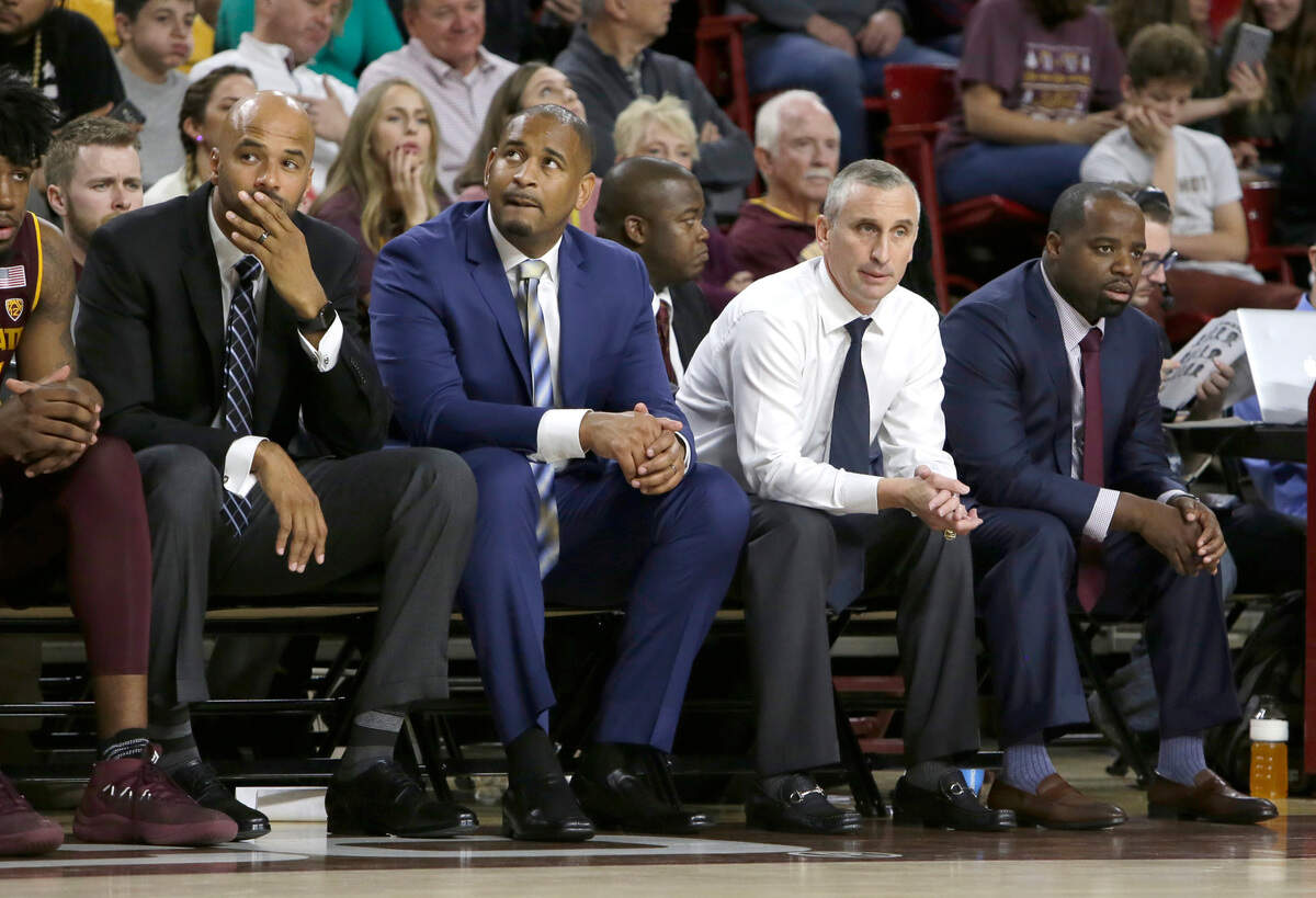 Arizona State coaches, left to right, Anthony Coleman, Levi Watkins , Bobby Hurley, and Rashon Burno watch during their game against Vanderbilt in December 2017, in Tempe, Ariz.