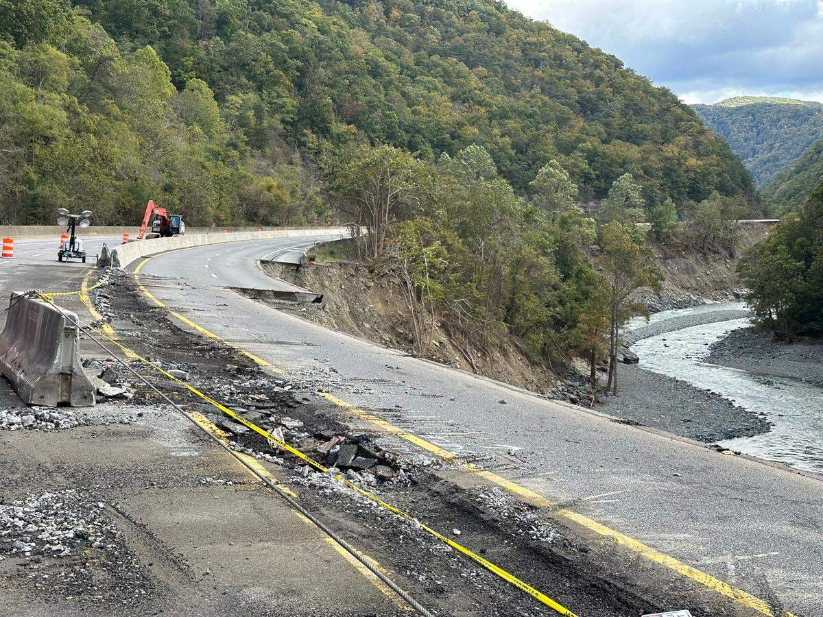 This is one of about 10 places where the swollen Pigeon River washed away pavement along the eastbound lanes of Interstate 40 after Hurricane Helene. About 7,000 linear feet of pavement will need to be replaced along a four-mile stretch of I-40 near the Tennessee line.