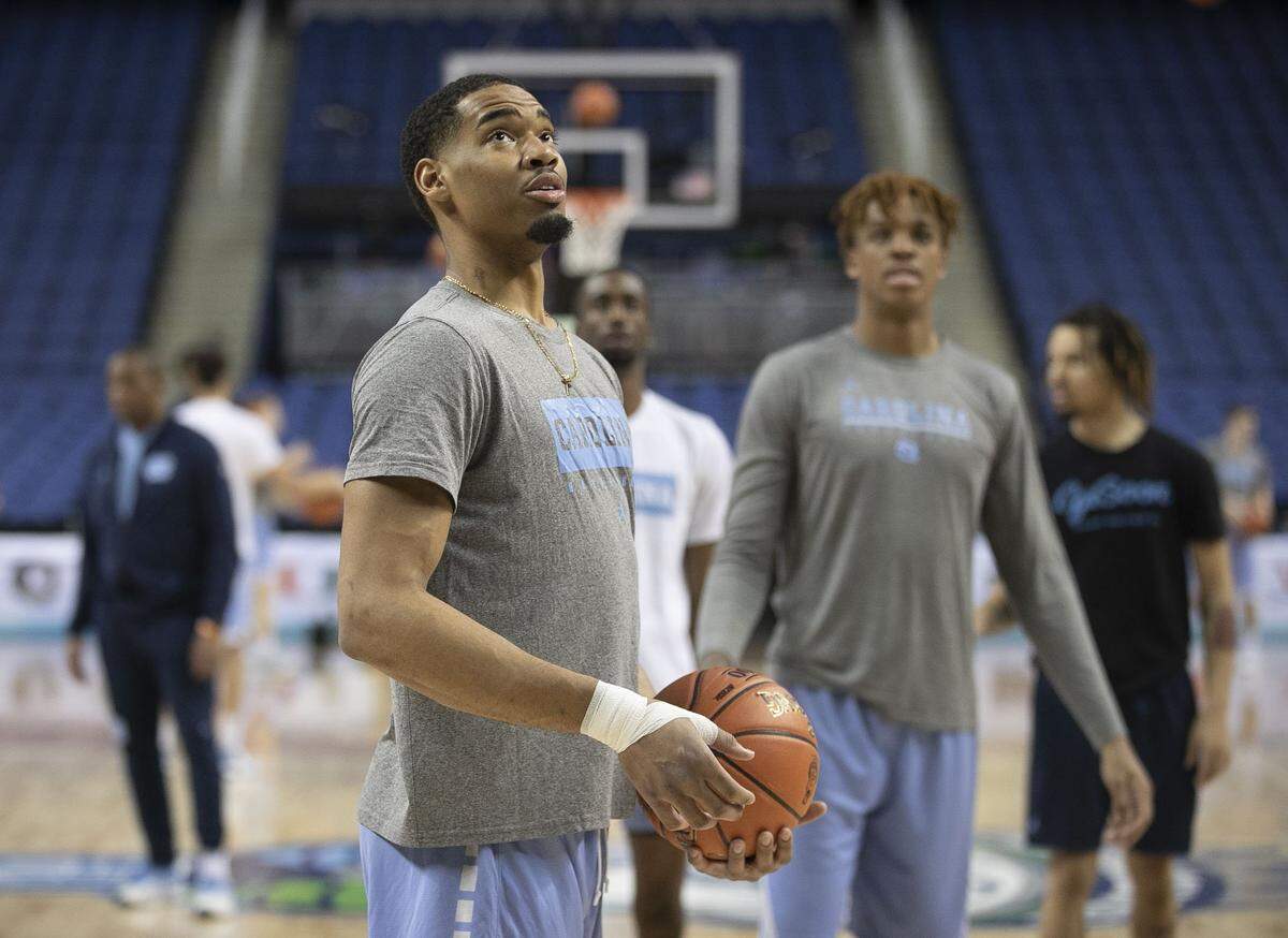 North Carolina’s Garrison Brooks (15) studies the rim as he and his teammates practice on Monday, March 9, 2020 at the Greensboro Coliseum in preparation for their ACC Tournament first round game against Virginia Tech.
