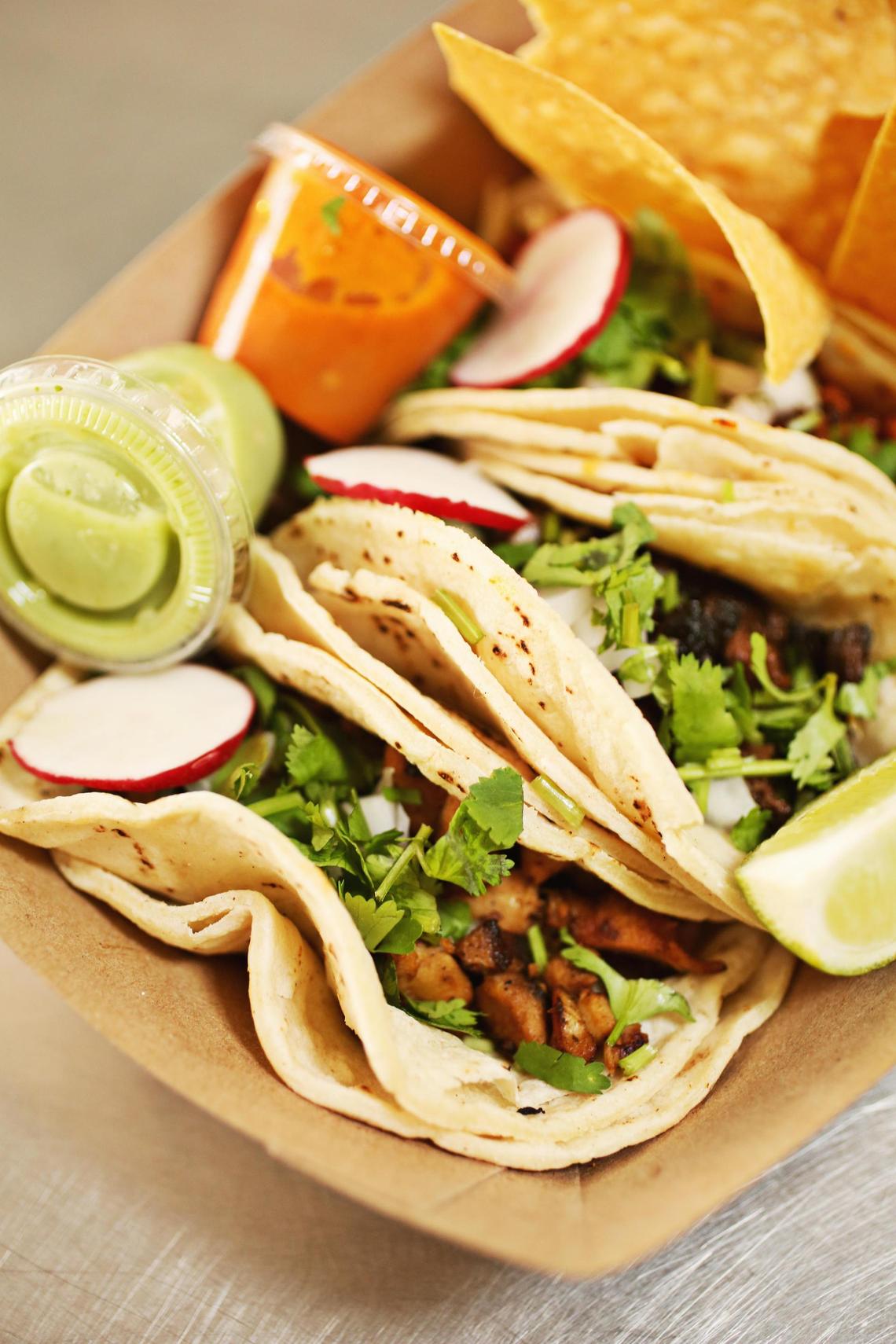 Mr. Puebla Tacos served three tacos to an order, available with your choice of meat (chicken, al pastor pork or carne asada) and served in homemade soft corn tortillas. Traditionally topped with chopped onions and cilantro and a garnishing slice of radish, the tacos come with chips and salsa (red or green) on the side.