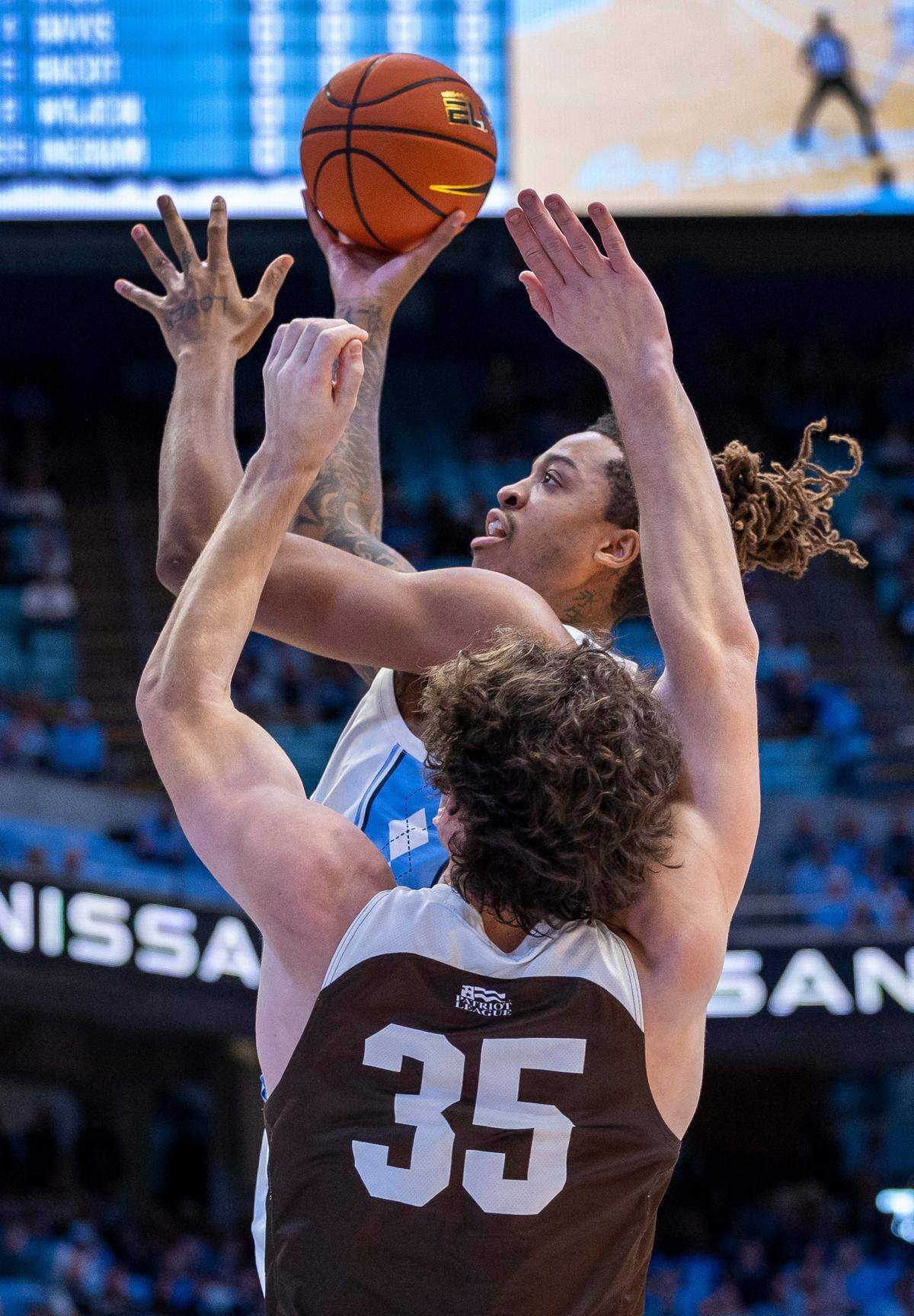 North Carolina’s Armando Bacot (5) puts up a shot against Lehigh’s Dominic Parolin (35) in the first half on Sunday, November 12, 2023 at the Smith Center in Chapel Hill, N.C.
