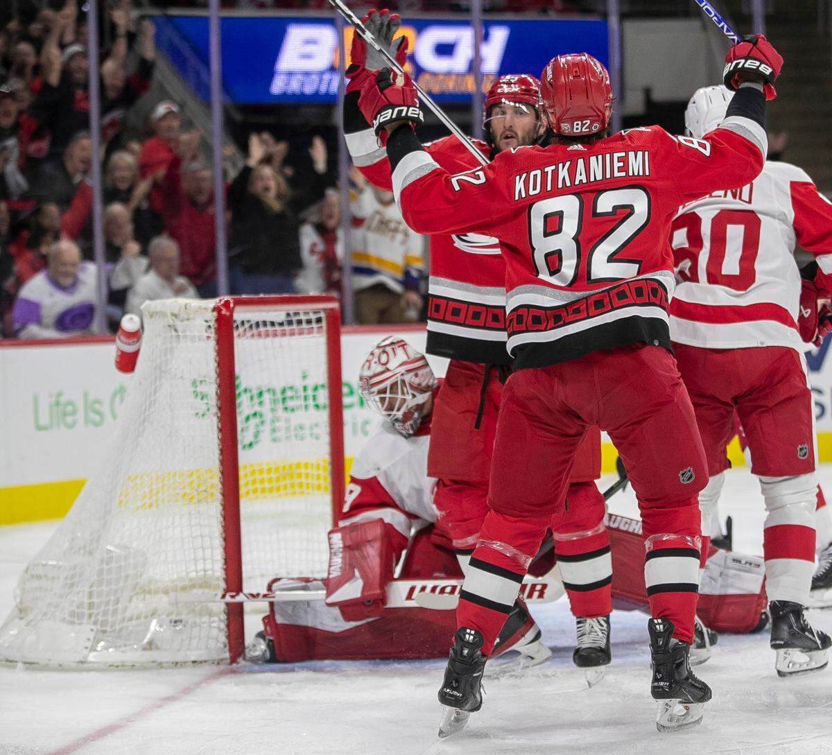 Carolina Hurricanes’ Stefan Noesen (23) and Jesperi Kotkaniemi (82) react after a goal by Noesen to give the Hurricanes a 1-0 lead in the first period on Tuesday, April 11, 2023 at PNC Arena in Raleigh, N.C.