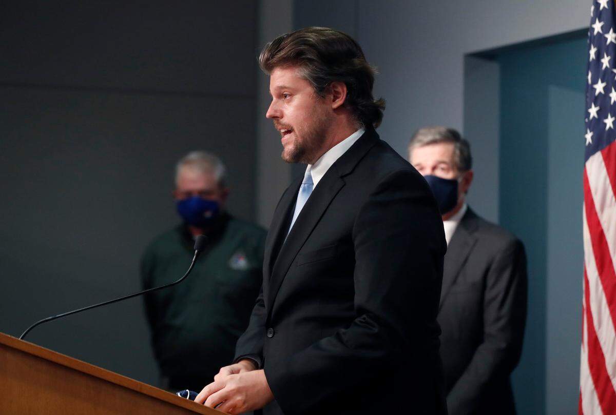 Kody Kinsley, Deputy Secretary at the N.C. DHHS, answers a question during a press conference on North Carolina’s preparations for Hurricane Isaias at the Emergency Operations Center in Raleigh, N.C., Friday, July 31, 2020.