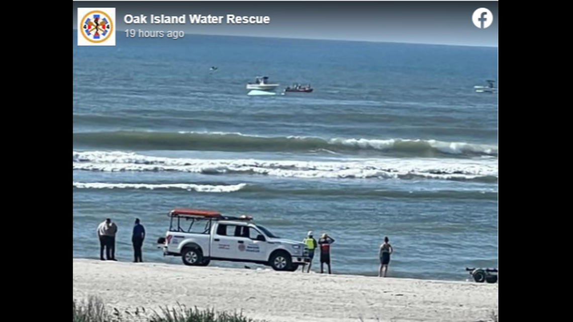 The man had been clinging to his overturned boat for hours in “harsh” waters, officials said.