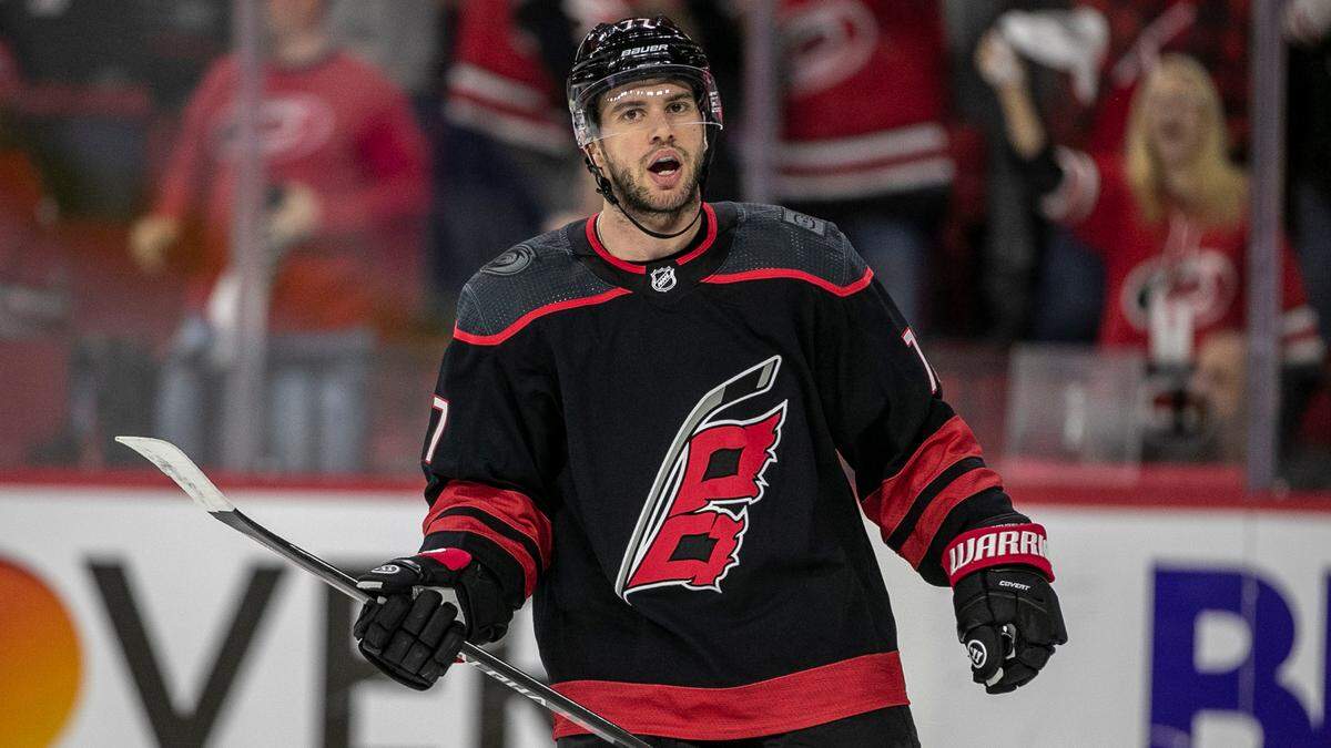 Carolina Hurricanes’ Tony DeAngelo (77) reacts after scoring a goal in the first period to give the Hurricanes a 2-0 lead over Boston on Tuesday, May 10, 2022 during game five of their Stanley Cup first round series at PNC Arena in Raleigh, N.C.