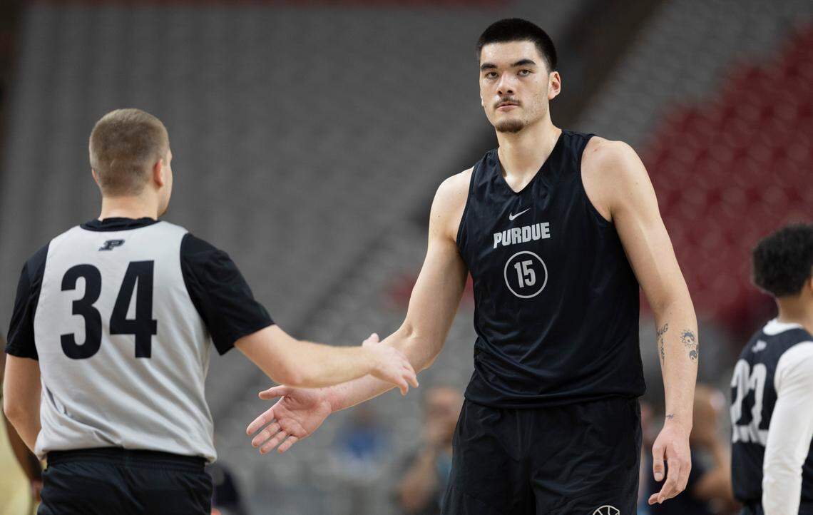Purdue center Zack Edey (15) and guard Carson Barrett (34) work out during the Boilermakers’ practice on Friday, April 5, 2024, as they prepare for their NCAA National Semi-Final game against N.C. State at State Farm Stadium in Glendale, AZ.