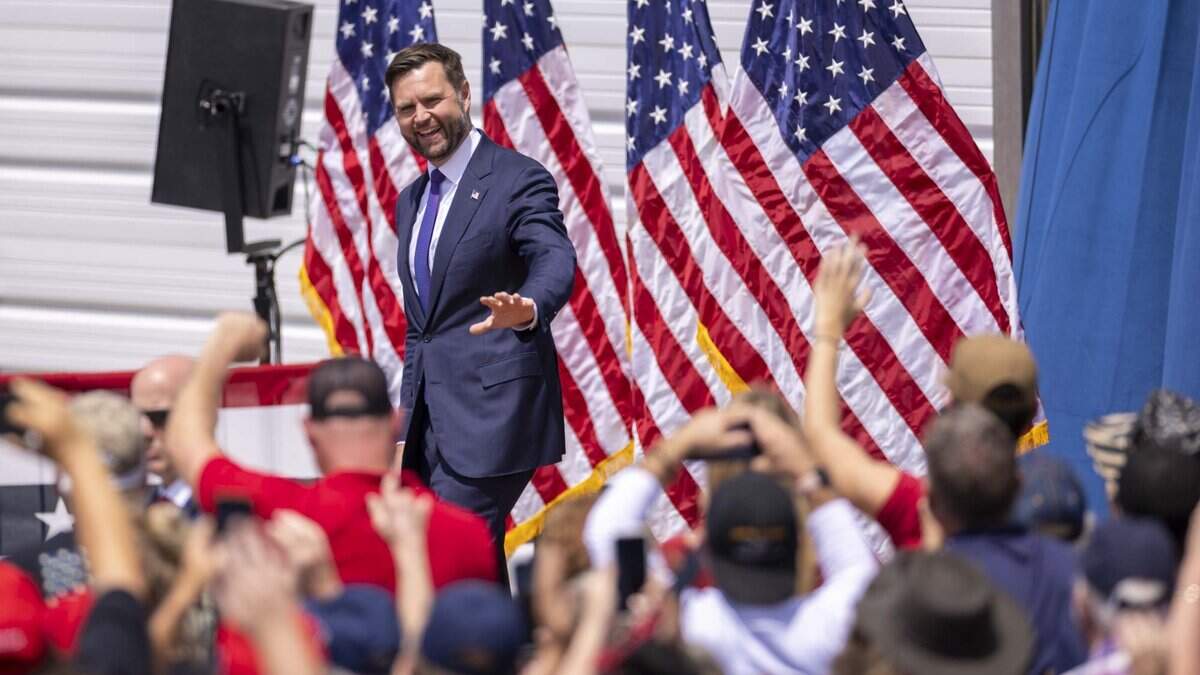 Sen. JD Vance, former President Donald Trump’s running mate, takes the stage during a rally at the North Carolina Aviation Museum & Hall of Fame in Asheboro, NC on Wednesday, Aug. 21, 2024.