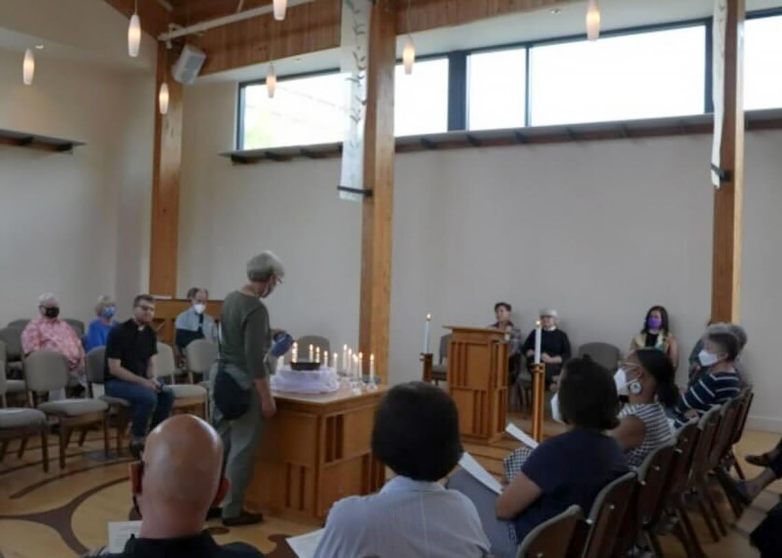 A Pullen Memorial Baptist Church member pours water into an overflowing bowl as an “offering of tears” for those impacted by the Supreme Court’s decision to overturn Roe v. Wade.