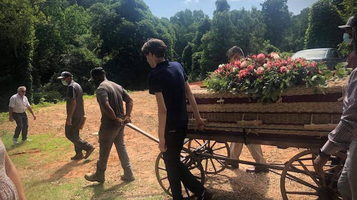 A green funeral featuring a biodegradable casket for Beverley Anne Babb, held at Wake Memorial’s green burial site, Pine Forest, July 2021.