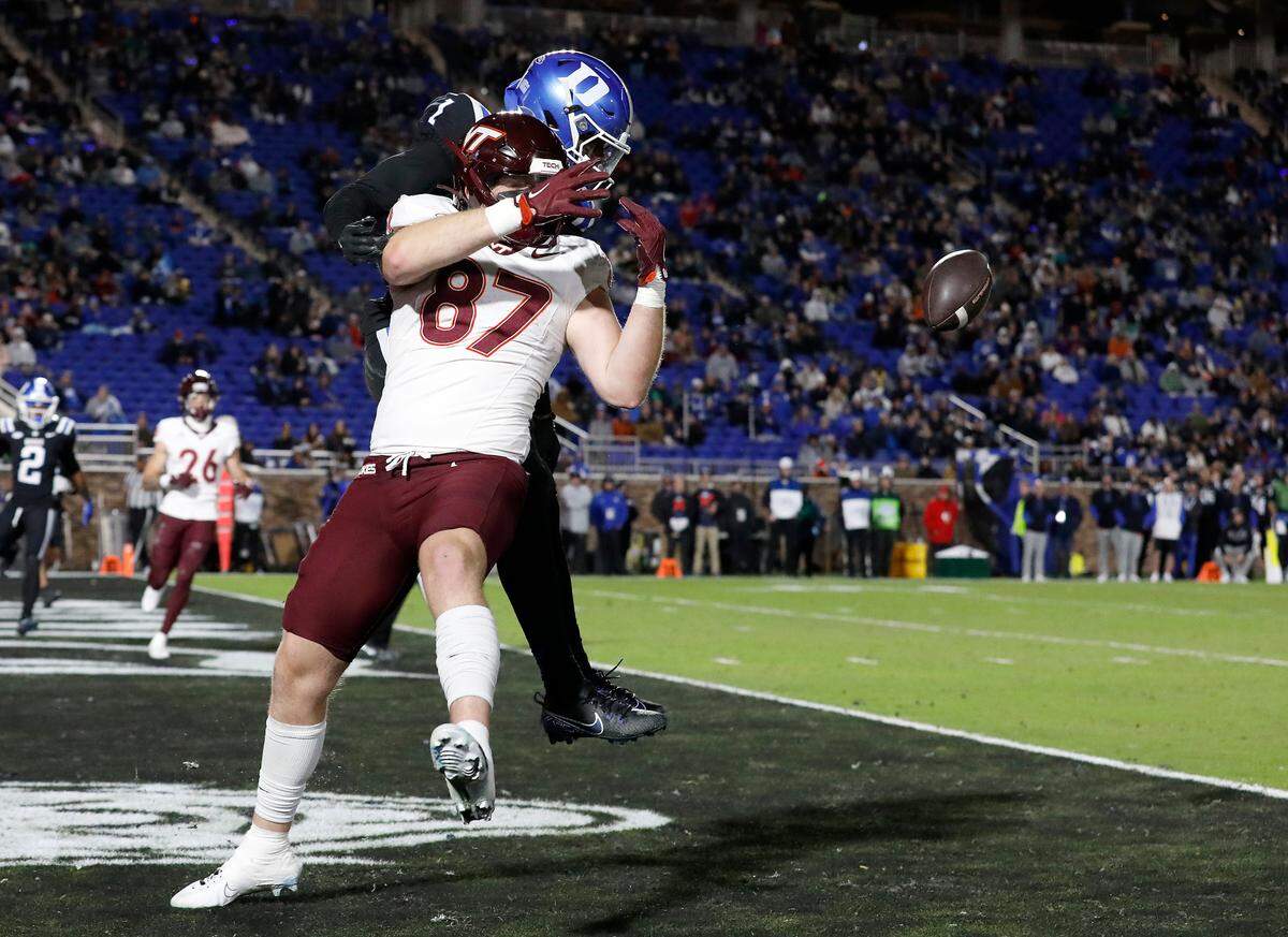 Duke’s Terry Moore pressures a pass intended for Virginia Tech’s Harrison Saint Germain during the first half of the Blue Devils’ game on Saturday, Nov. 23, 2024, at Wallace Wade Stadium in Durham, N.C.