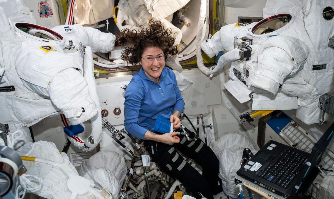 Expedition 60 Flight Engineer Christina Koch of NASA works inside the Quest joint airlock cleaning U.S. spacesuit cooling loops and replacing spacesuit components.