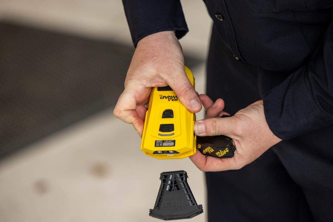 Edenton police officers train with BolaWrap, a restraint device that police departments across the country are trying. Edenton was the first department to use BolaWrap in North Carolina in 2019.