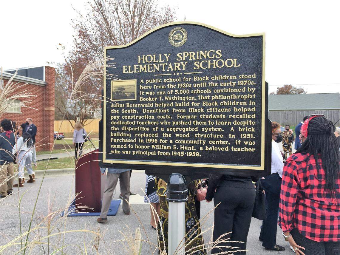 A new marker recounts the history of Holly Springs Elementary School, which started as a Rosenwald School in 1924, moved into a new school in 1951, and closed in 1970 following desegregation.