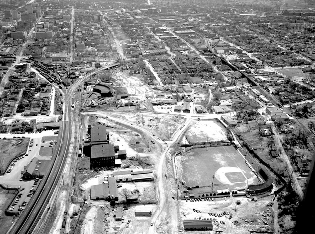 An aerial photo of Raleigh shows the 1883 turntable with its semi-circular sheds just left of center.