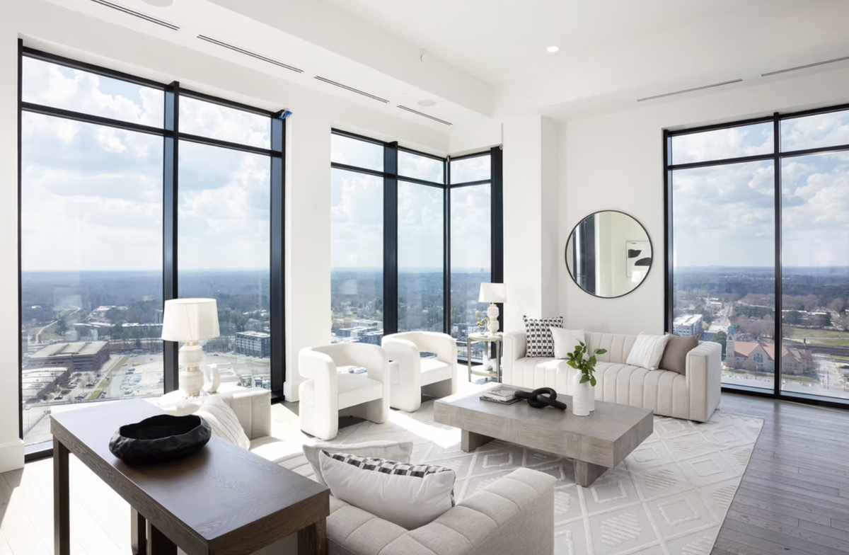The living room inside The Novus’ Unit 2702.