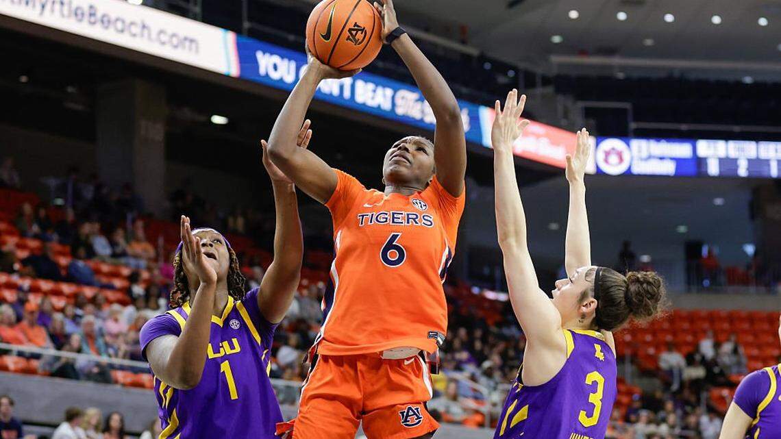 AUBURN, ALABAMA - FEBRUARY 8: Khady Leye #6 of the Auburn Tigers shoots the ball as Amiya Joyner #1 and Bella Hines #3 of LSU Tigers defend during the second half at Neville Arena on February 8, 2026 in Auburn, Alabama. (Photo by Stew Milne/Getty Images)