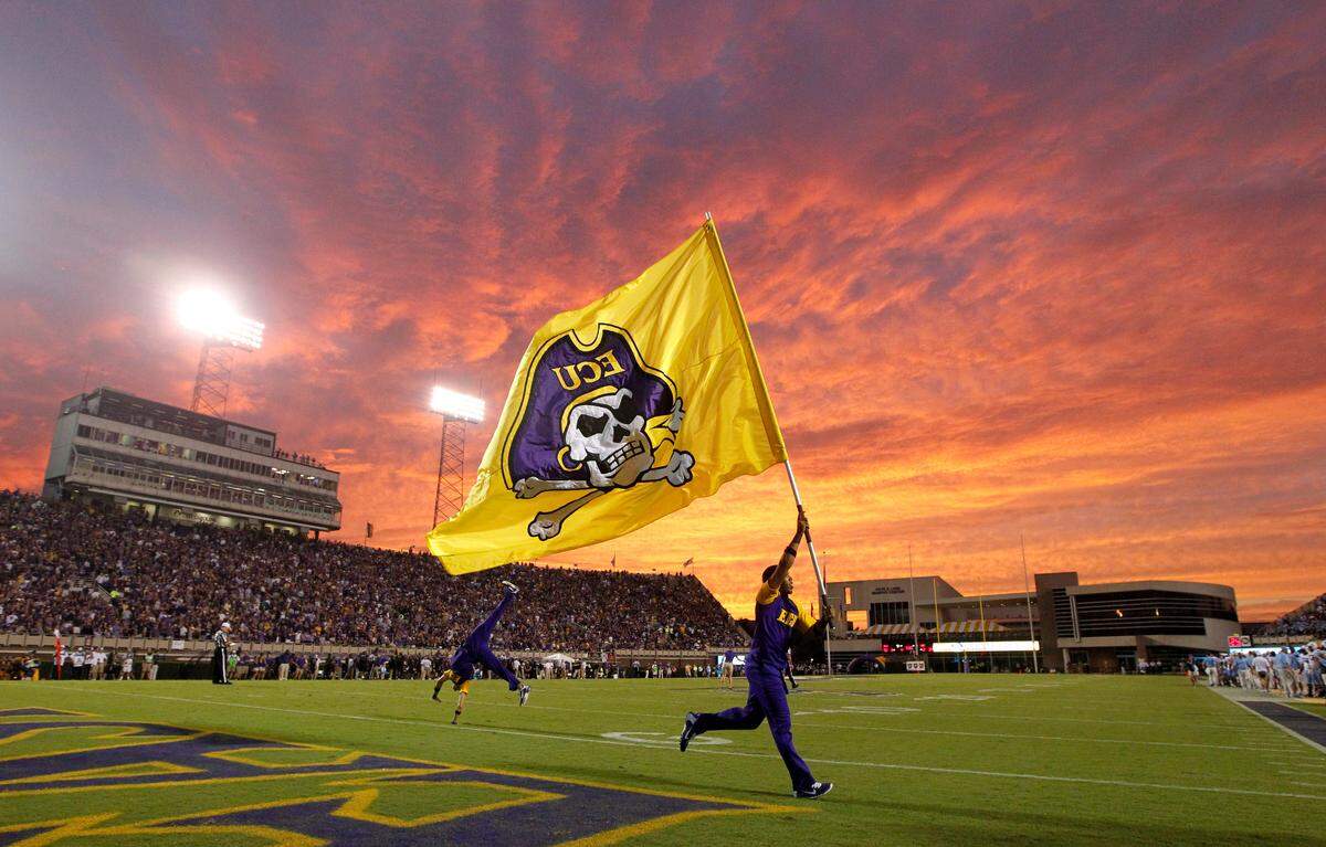 East Carolina celebrates after scoring during the second half of East Carolina’s 70-41 victory over UNC at Dowdy-Ficklen Stadium in Greenville, N.C., Saturday, September 20, 2014.  