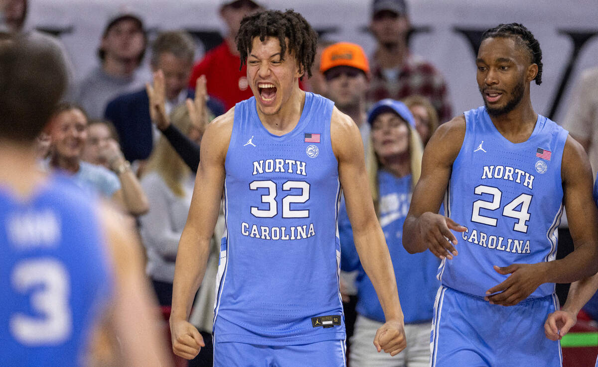 North Carolina’s James Okonkwo (32) celebrates as the Tar Heels open a 17 point lead late in the second half against N.C. State on Wednesday, January 10, 2024 at PNC Arena in Raleigh, N.C. North Carolina rolled to a 67-54 victory.