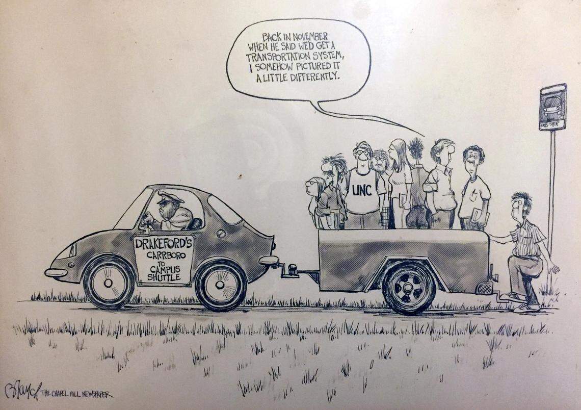 Former Carrboro Mayor Robert “Bob” Drakeford brought this framed political cartoon from his tenure to the Carrboro Mayors Roundtable on Monday, Oct. 15, 2018. Drakeford was a reformer supported by the Carrboro Community Coalition who pushed for creating Chapel Hill Transit to serve the many UNC students who were making their home in the town’s newly built apartments.
