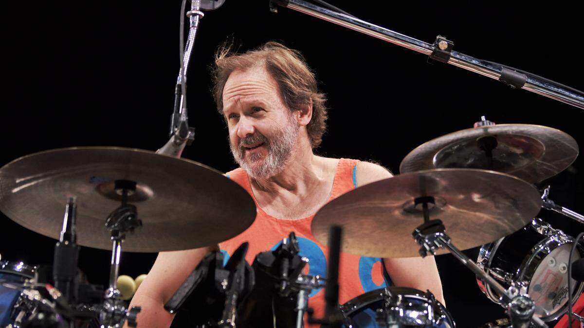 Phish drummer Jon Fishman takes his seat behind his drum kit as the band prepares to open their show at Coastal Credit Union Music Pavilion at Walnut Creek in Raleigh, N.C., Friday night, July 29, 2022.