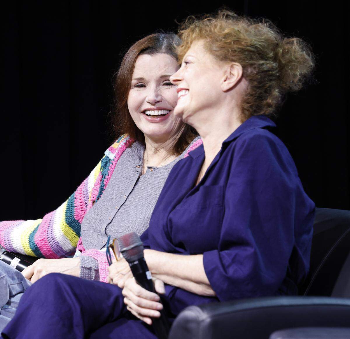 Geena Davis laughs with Susan Sarandon during a “Q&A with Thelma and Louise” at GalaxyCon Raleigh at the Raleigh Convention Center Saturday, July 26, 2025.