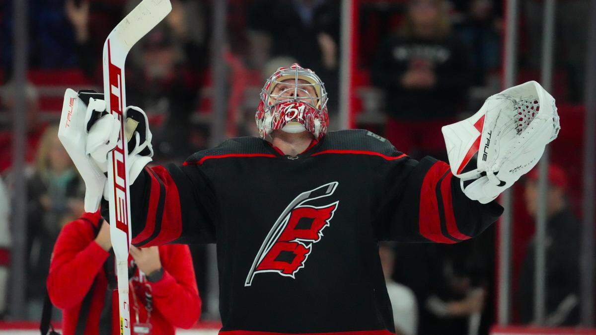 Mar 7, 2024; Raleigh, North Carolina, USA; Carolina Hurricanes goaltender Frederik Andersen (31) celebrates their victory after the game against the Montreal Canadiens at PNC Arena. Mandatory Credit: James Guillory-USA TODAY Sports