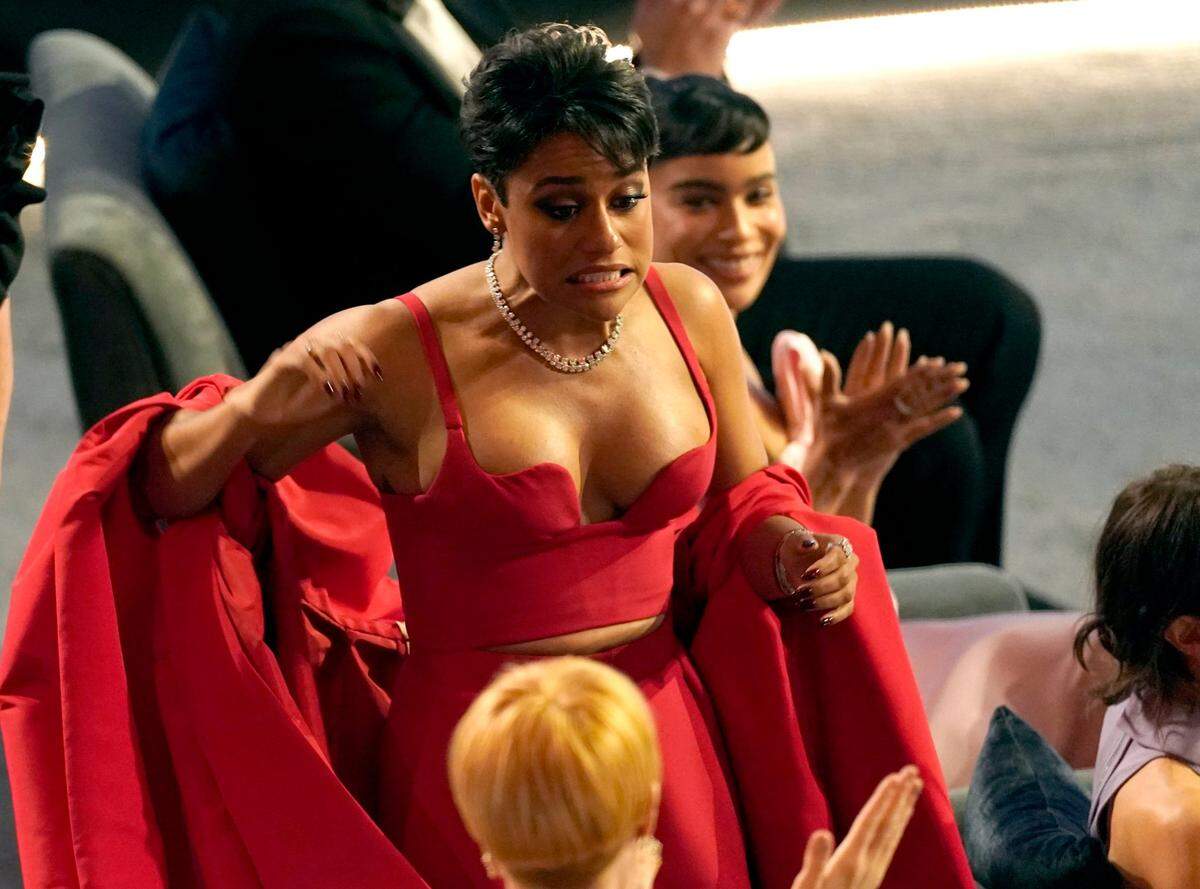 Ariana DeBose reacts in the audience as she is announced winner for best performance by an actress in a supporting role for “West Side Story” at the Oscars on Sunday, March 27, 2022, at the Dolby Theatre in Los Angeles.