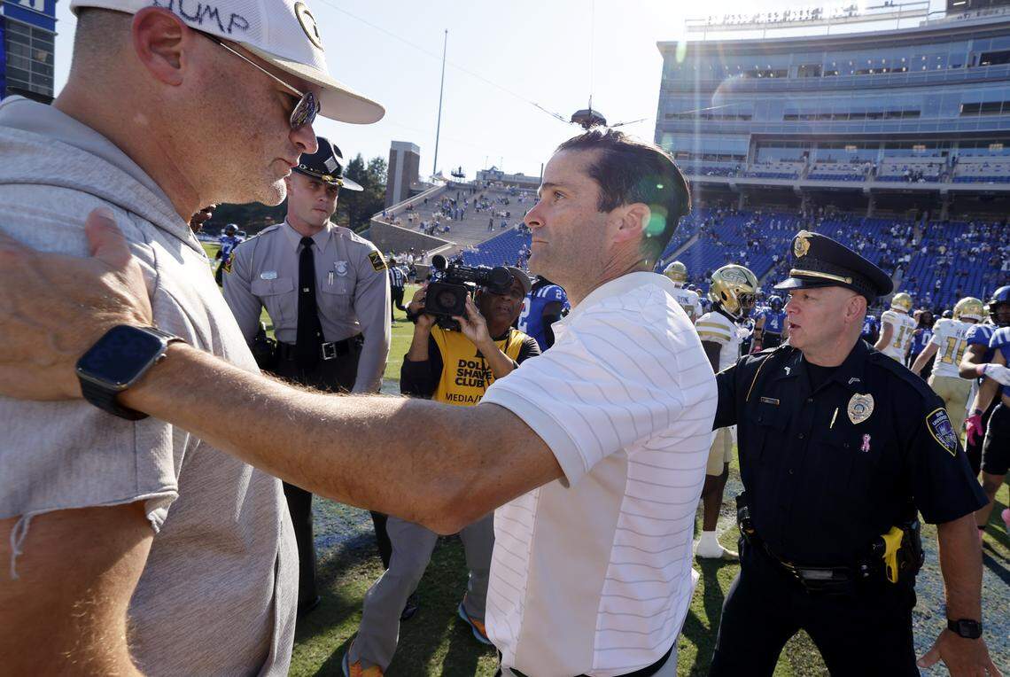 Duke head coach Manny Diaz congratulates Georgia Tech head coach Brent Key after Georgia Tech’s 27-18 victory over Duke at Wallace Wade Stadium in Durham, N.C., Saturday, Oct. 18, 2025.