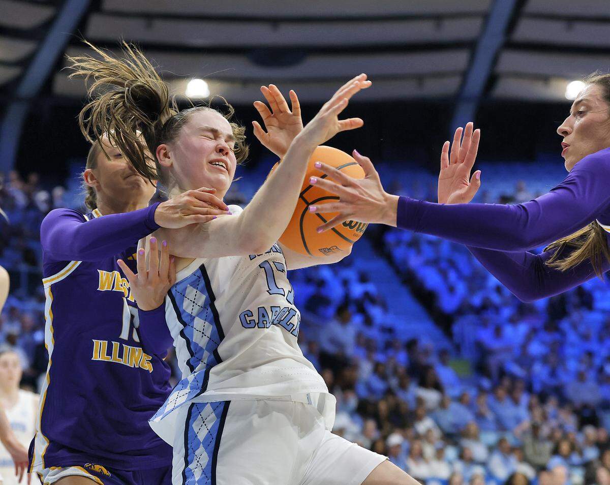 North Carolina’s Elina Aarnisalo is pressured by Western Illinois’ Addi Brownfield and Mallory Shetley during the first half of the Tar Heels’ first-round NCAA Tournament game on Friday, March 20, 2026, at Carmichael Arena in Chapel Hill, N.C.