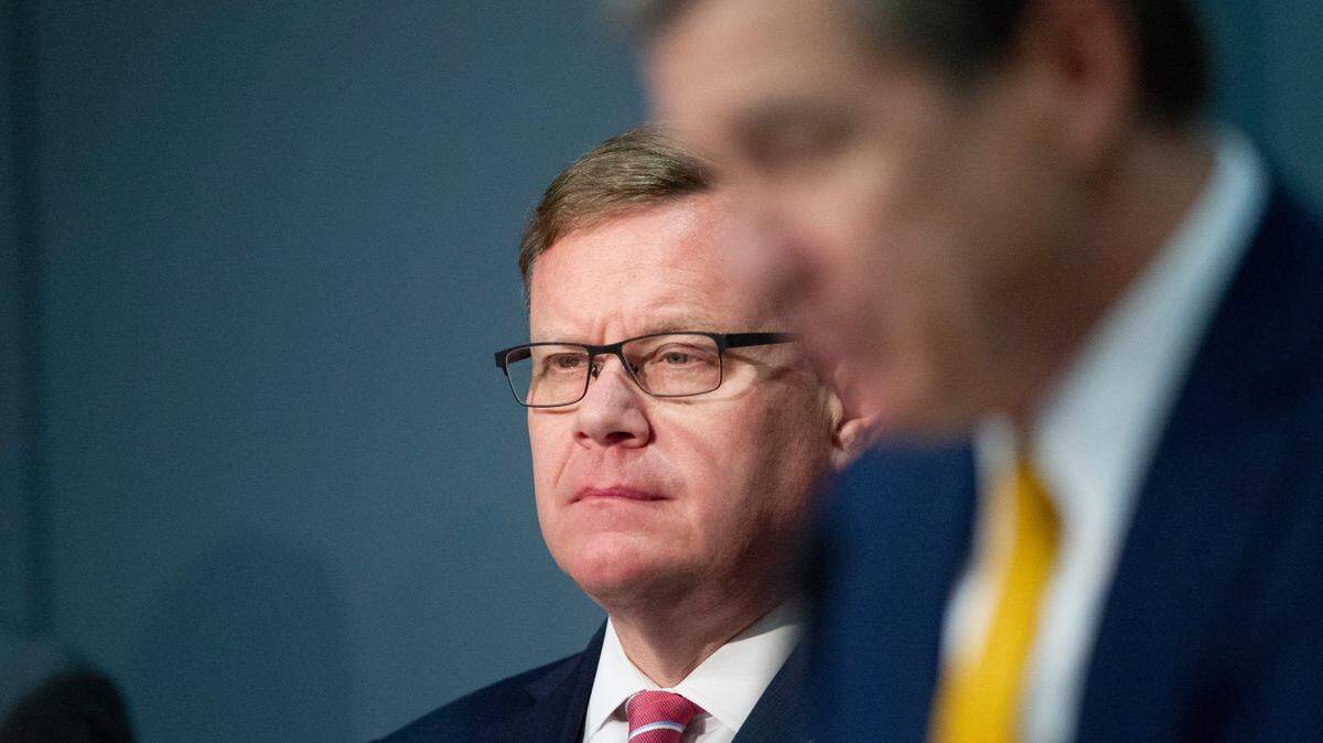 Gov. Roy Cooper speaks as House Speaker Tim Moore looks on during a briefing on North Carolinas coronavirus pandemic response Monday, May 4, 2020 at the NC Emergency Operations Center in Raleigh.