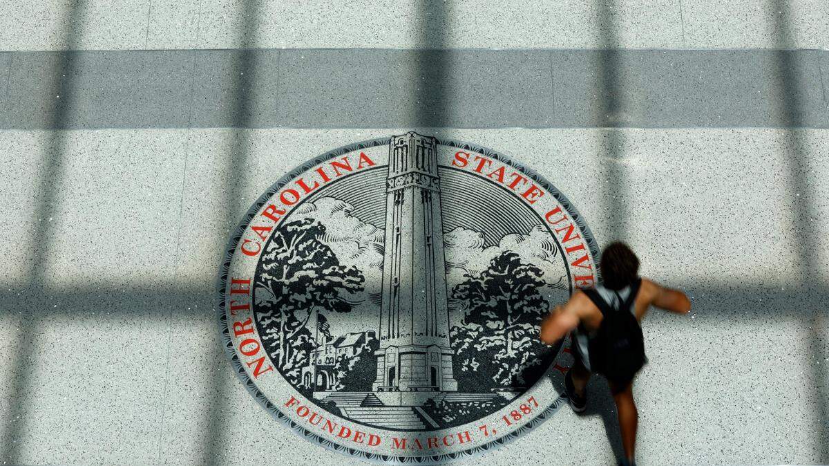 The N.C. State University seal, photographed Thursday, August 4, 2022, on the floor of the Talley Student Union at N.C. State in Raleigh, N.C.